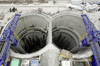 Two vertical tunnel shafts and access structures for underground works and tunnel construction.