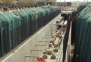 Design and construction of the South Utility Tunnel and associated utility lines as portable facilities