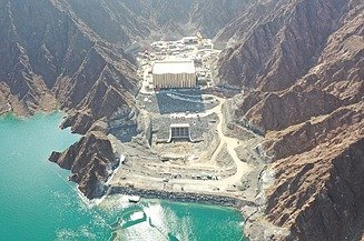 View of the Hatta Dam, reservoir and associated water infrastructure in the Hajar Mountains of the United Arab Emirates.